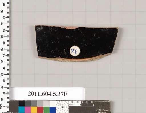 Terracotta fragment of a kylix (drinking cup)
