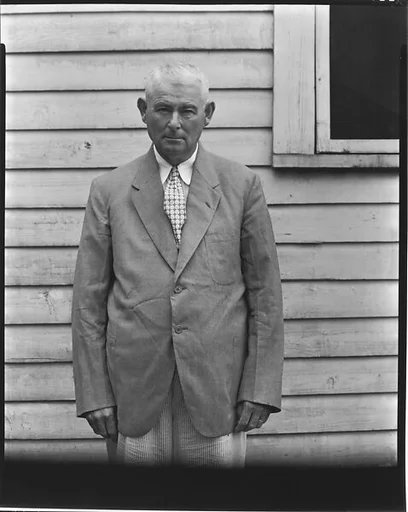 [Man in Suit Jacket and Seersucker Pants, Moundville, Alabama]