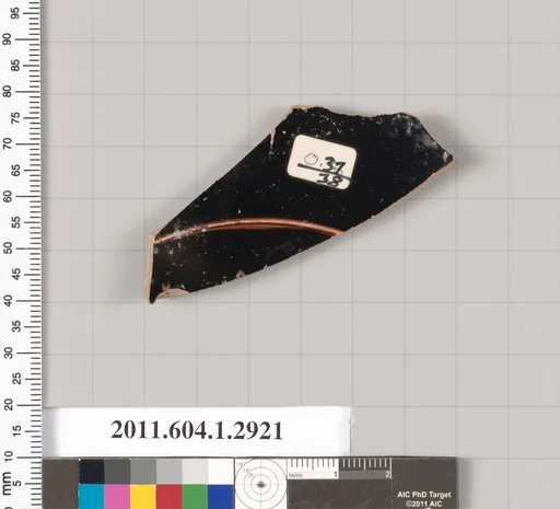 Terracotta fragment of a kylix (drinking cup)