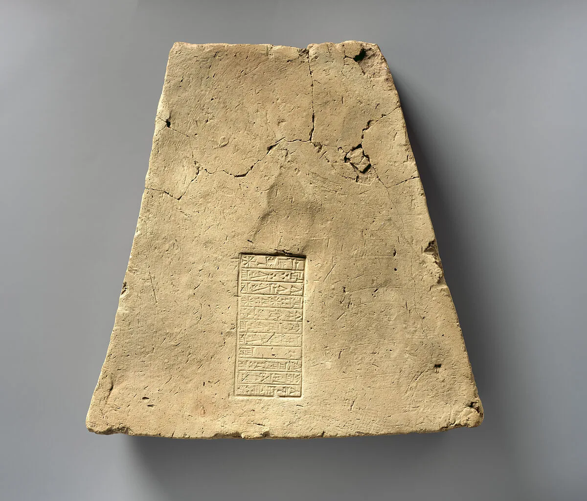 Brick with inscription of Ashurbanipal describing building work on Ekur, the temple of the god Enlil at Nippur — Unknown