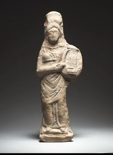 Standing female kithara player