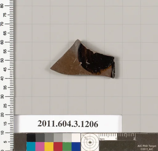 Terracotta fragment of a mastoid (drinking cup with narrow base) ?