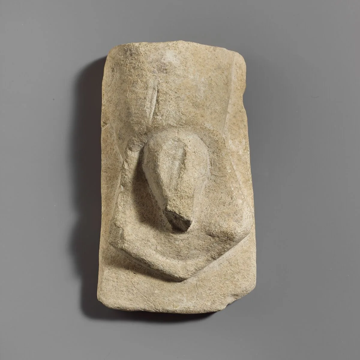 Stone votive relief of male genitalia — Unknown