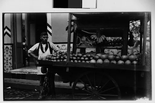 [Fruit Vendor Posing in Front of Cart, Havana]