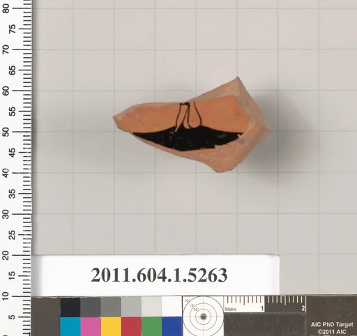 Terracotta fragment of a kylix (drinking cup)