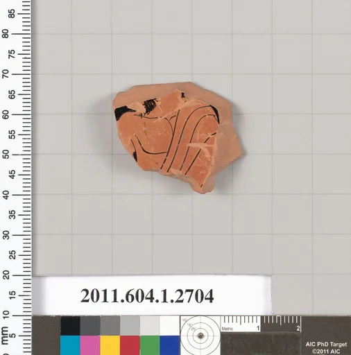 Terracotta fragment of a kylix (drinking cup)