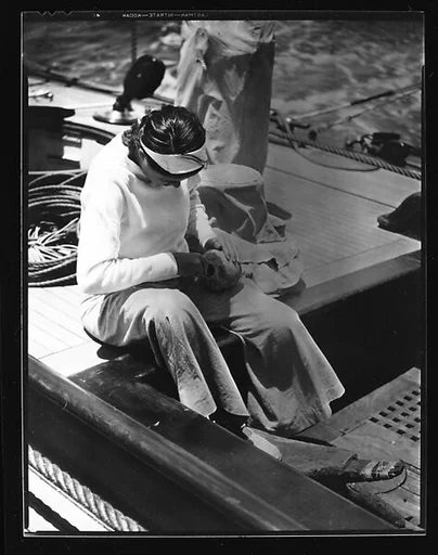 [South Seas: Polly Campbell Cutting a Cocoanut Aboard the Cressida]