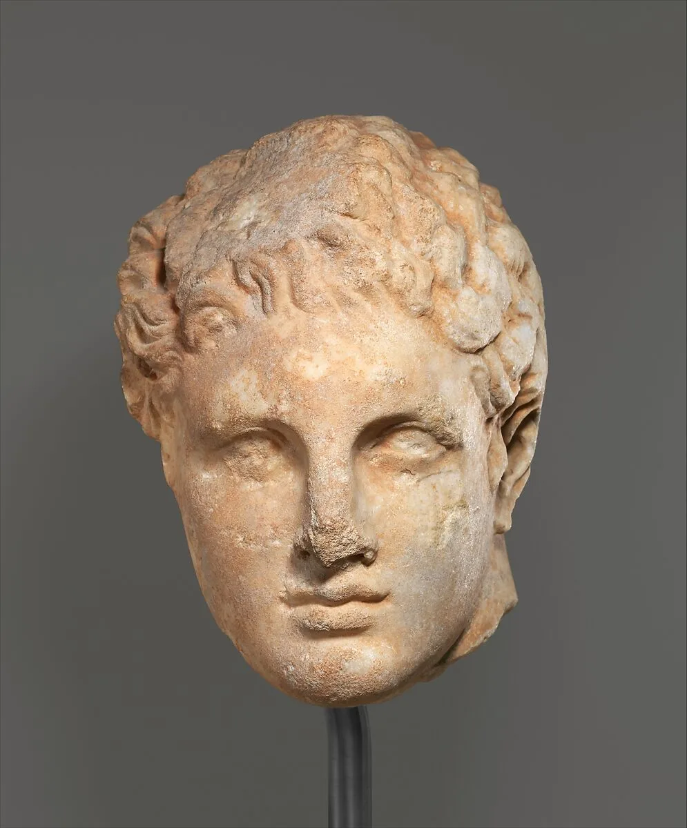 Marble head of a youth from a relief — Unknown
