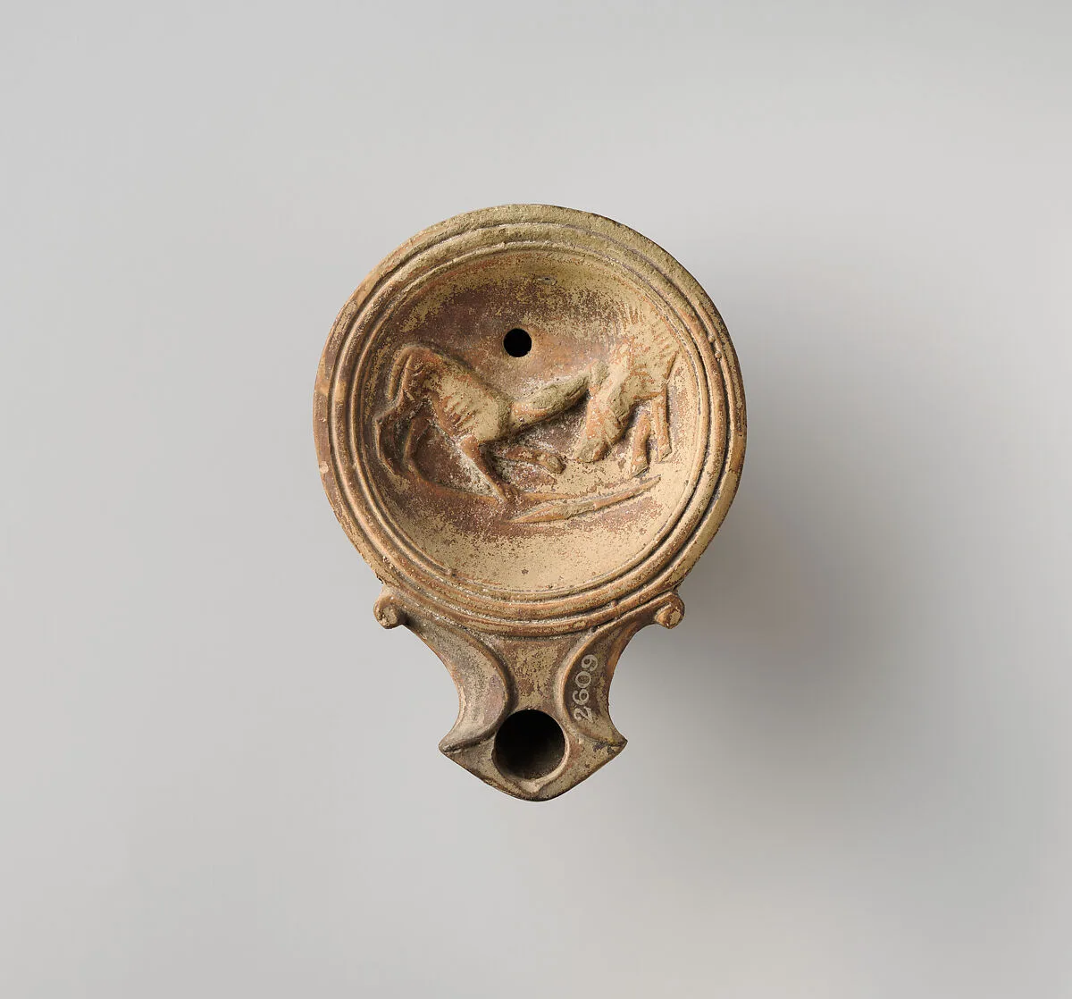 Terracotta oil lamp — Unknown