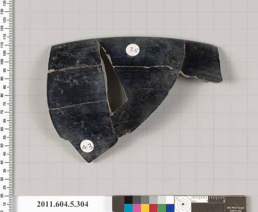 Terracotta rim fragment of a kylix (drinking cup)