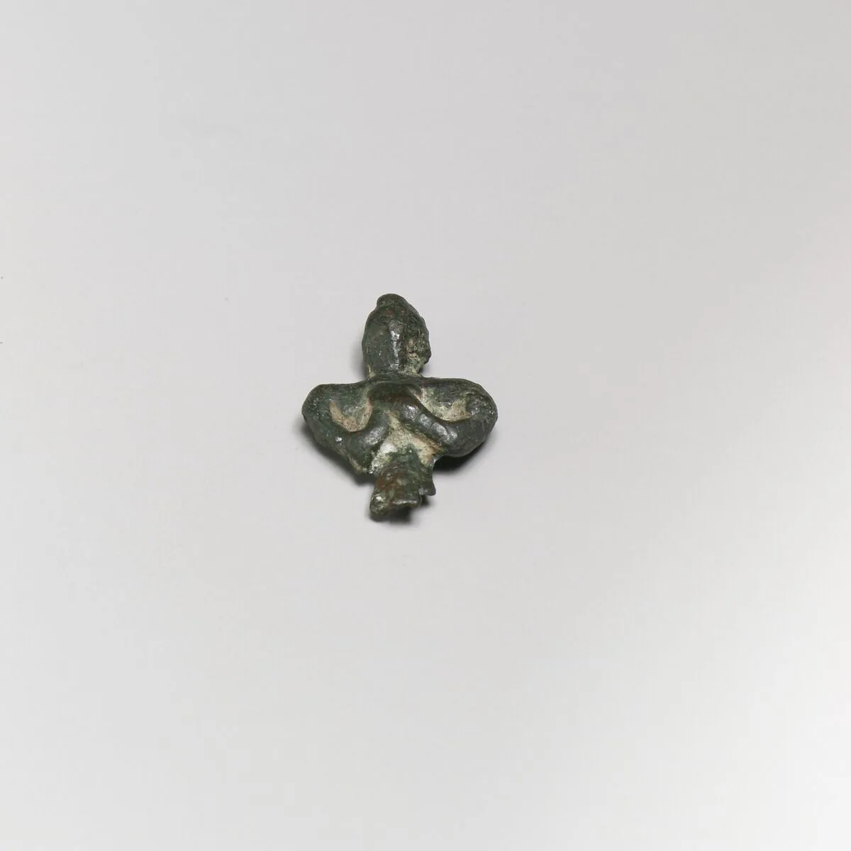 Fragmentary bronze statuette of a male votary — Unknown