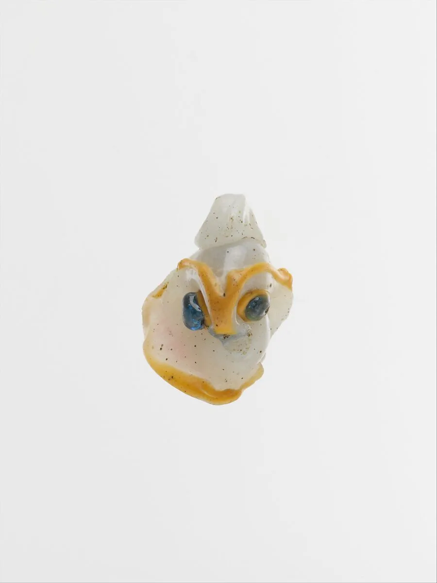 Glass pendant in the form of a demonic mask — Unknown