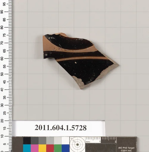 Terracotta fragment of a kylix: eye-cup (drinking cup)