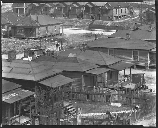 [Wooden Houses with Porches and Fenced Yards, From Elevated Position, Atlanta, Georgia]