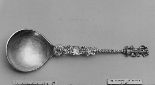 Figure-top spoon