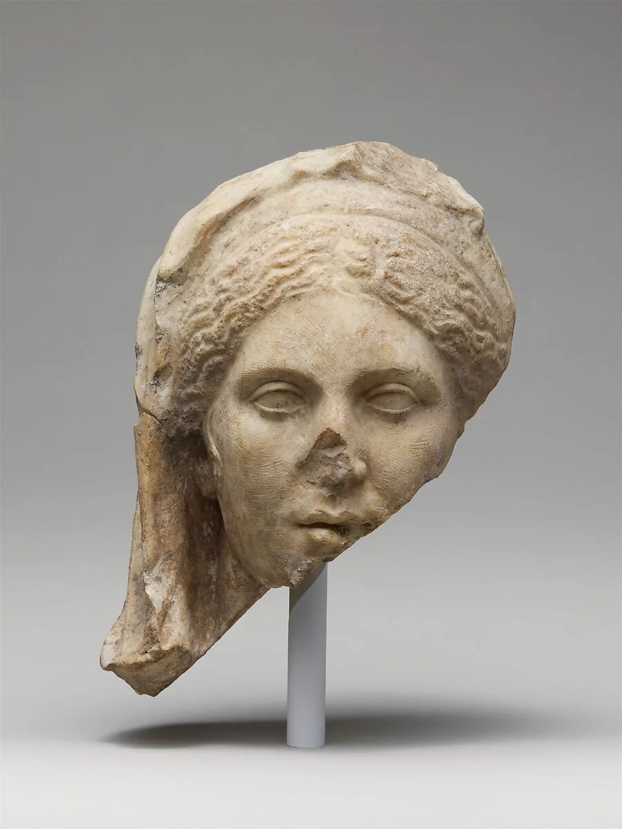 Marble head of a woman — Unknown