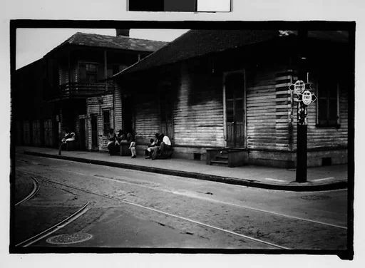 [People Seated on Stoops in French Quarter, New Orleans, Louisiana]