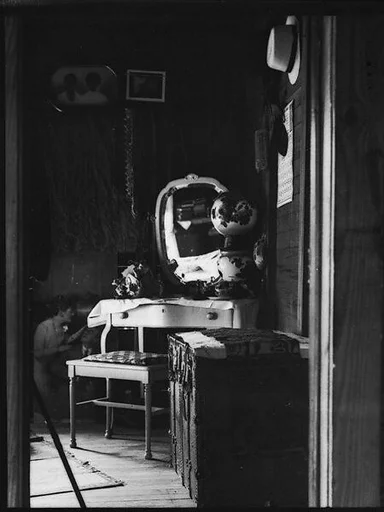 [Interior with Dressing Stand, Pictures, and Tie Rack, Near Hobe Sound, Florida]