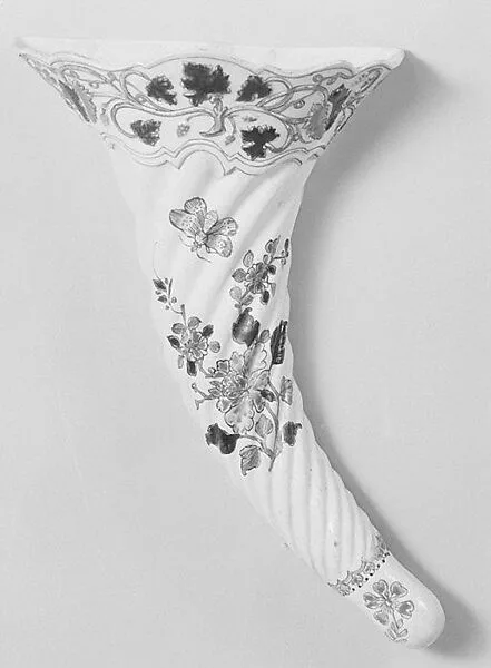 Pair of flower holders — Ginsburg & Levy, Inc.