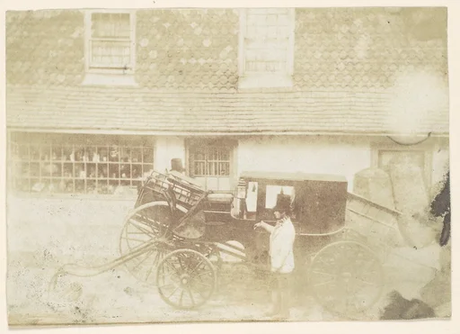 [Men By Carriage in Street]