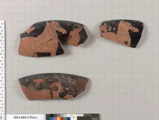 Terracotta rim fragments of a kylix (drinking cup)