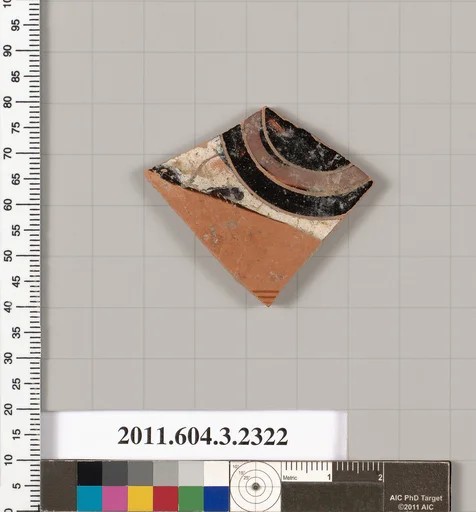 Terracotta fragment of a kylix: eye-cup (drinking cup)