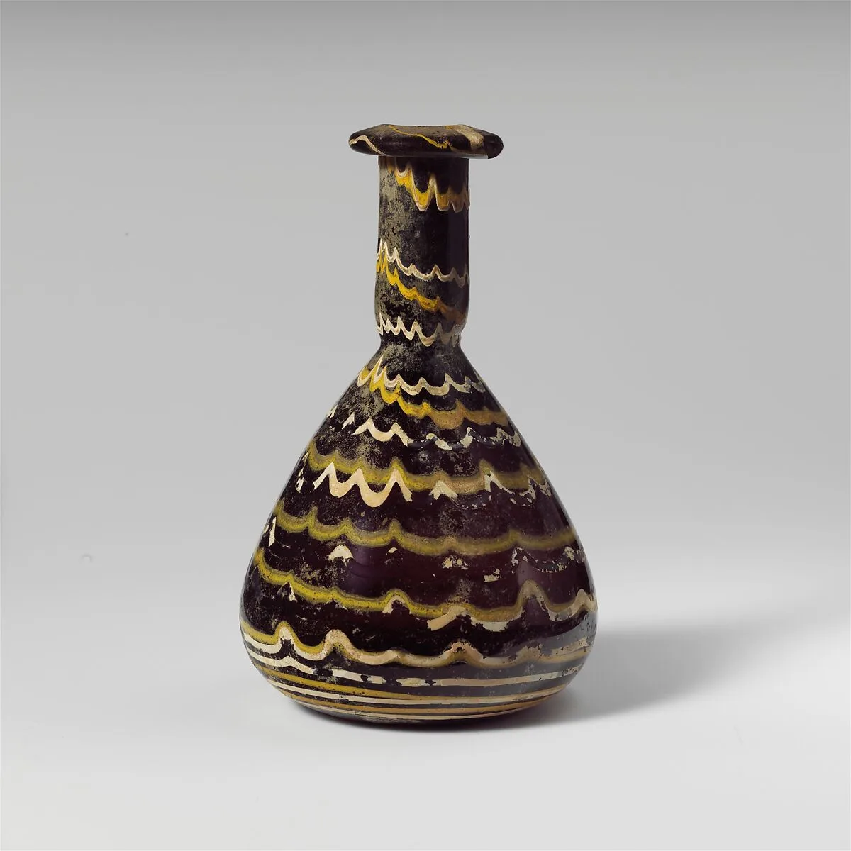 Glass bottle with marvered trails — Unknown