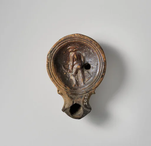 Terracotta oil lamp