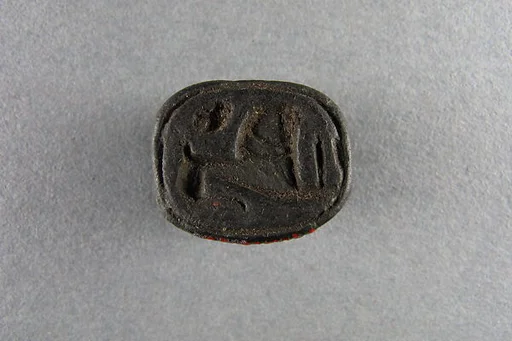 Scarab, sphinx, sun disk