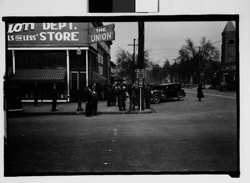 [Crowd on Street Corner, Milledgeville, Georgia]