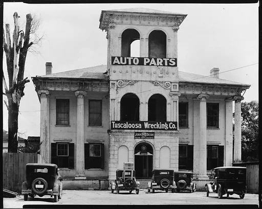 [Italianate Revival Building with Wrecking Company Signs on Tower, Alabama]