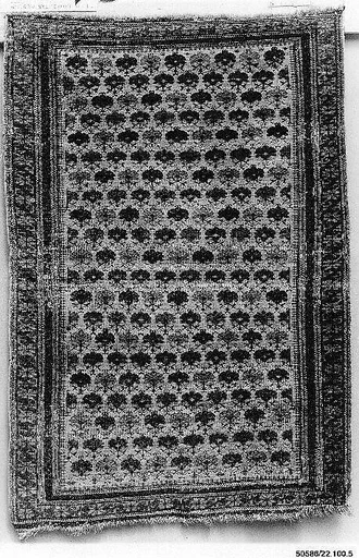 White-Ground Kuba Rug