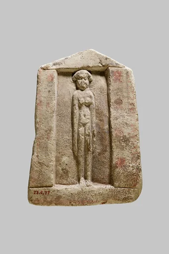 Plaque with nude female in a shrine niche
