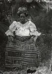 Woman outdoors – Ewe kente skirt, headtie and blouse