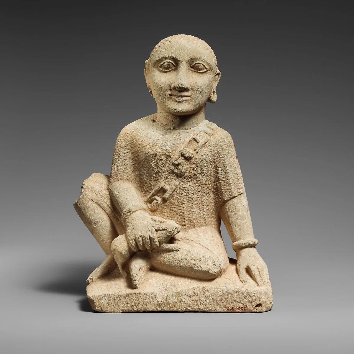 Limestone statuette of a temple boy — Unknown