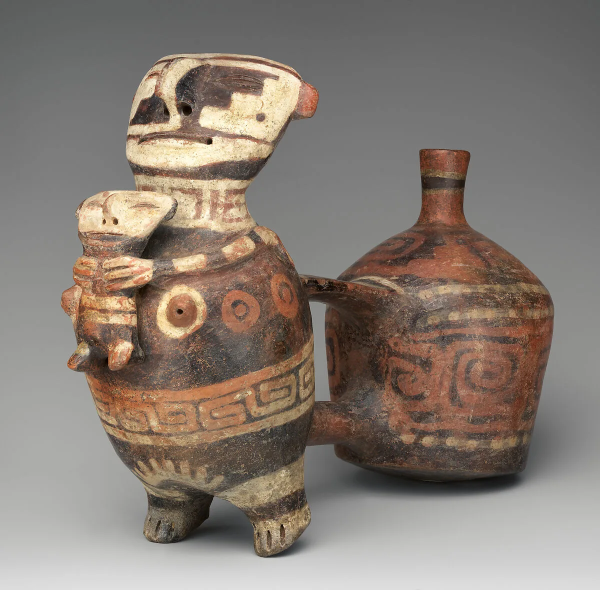 Double-chambered bottle with effigies figures — Vicús artist(s)