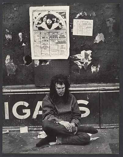 [Man Sitting on Street beneath Brooklyn Academy of Music Poster, New York]