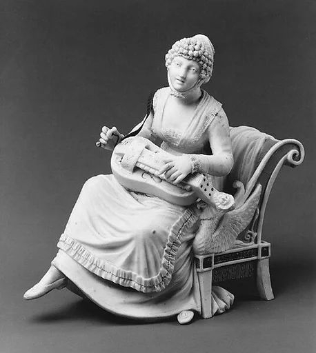 Woman playing a hurdy-gurdy