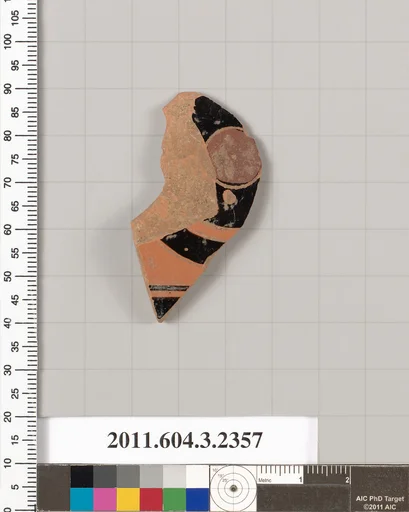 Terracotta fragment of a kylix: eye-cup (drinking cup)