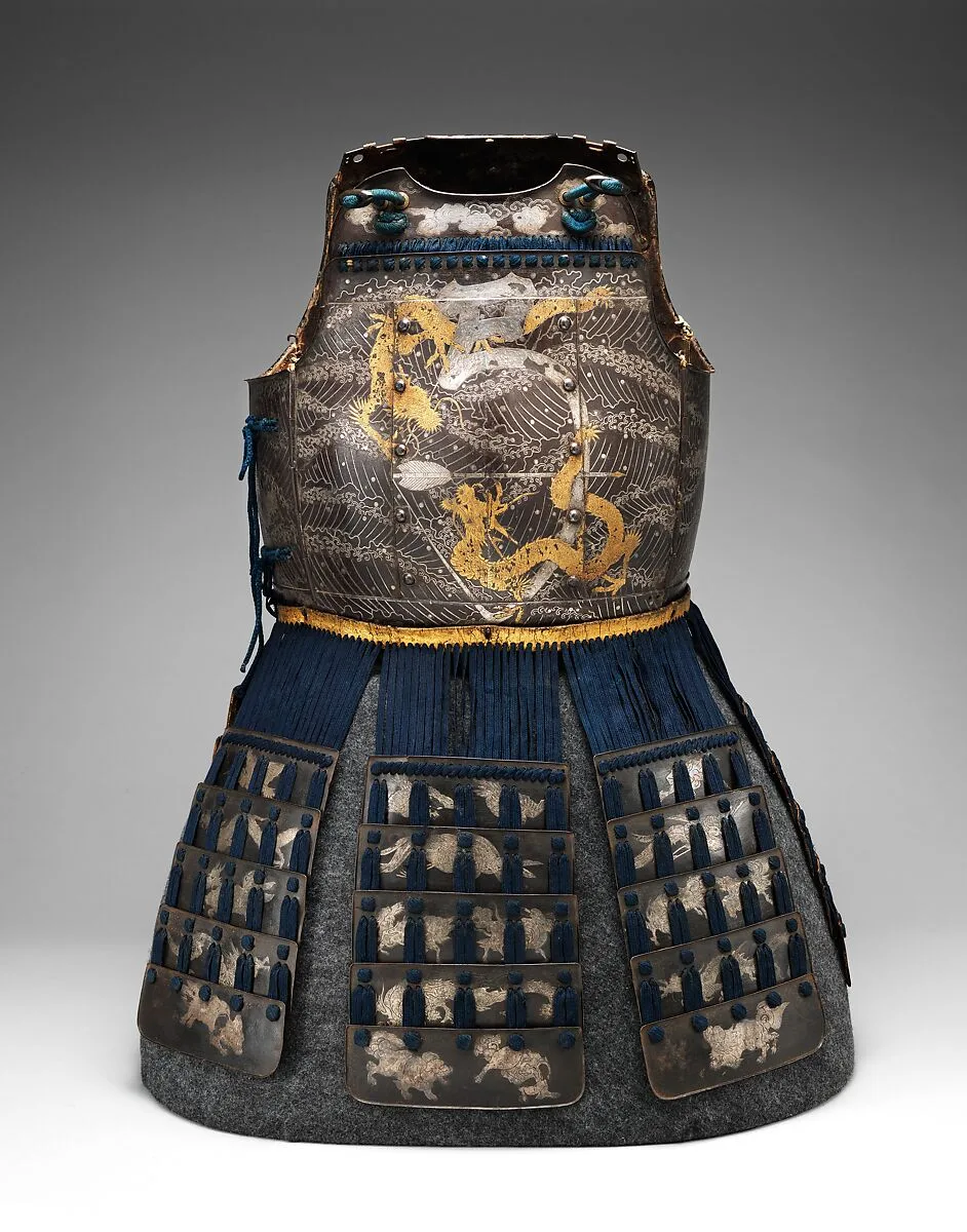 Cuirass (Armor for the Torso and Hips) and Greaves (Lower Leg Defenses) — Unknown