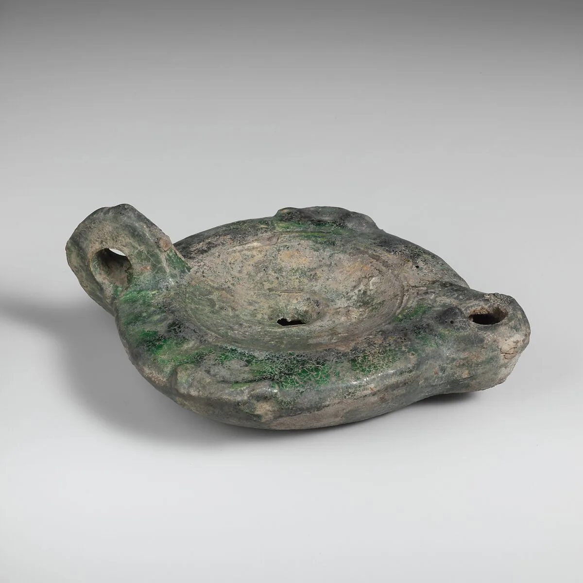 Terracotta lead-glazed lamp — Unknown