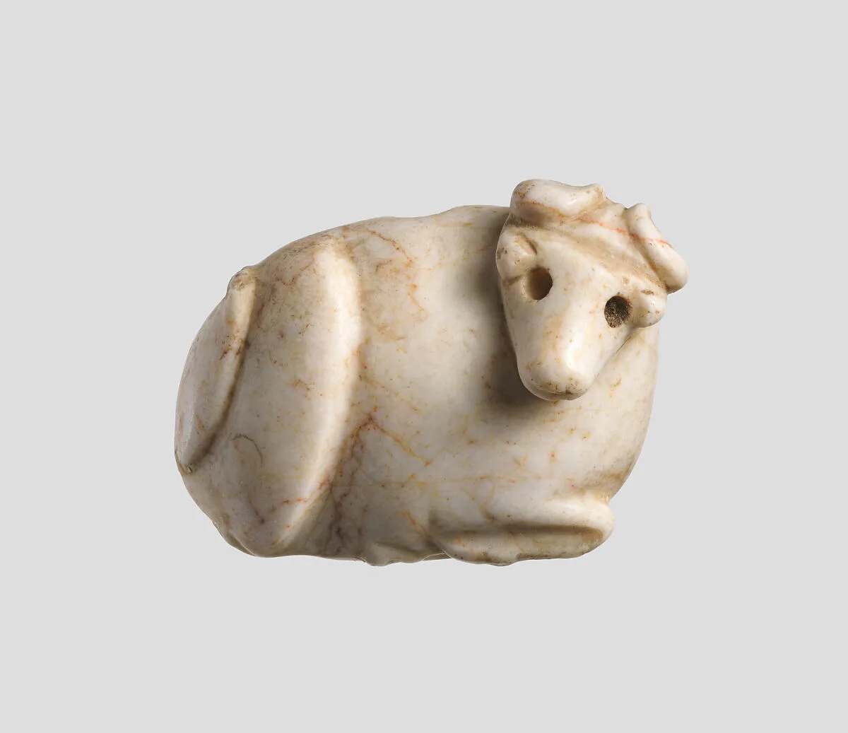 Seal amulet in the form of a reclining cow — Unknown