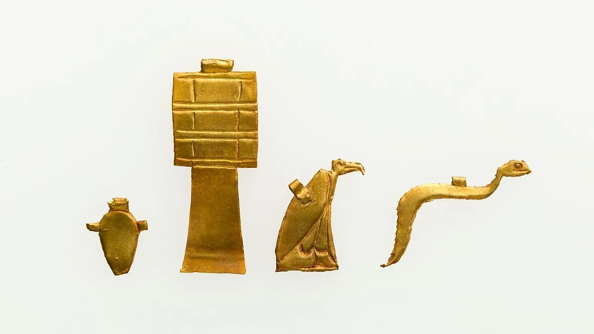 Group of Four Amulets: Cobra, Vulture, Djed Pillar, and Heart — Unknown