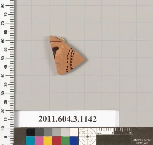 Terracotta fragment of a mastoid (drinking cup with narrow base) or a kyathos (cup-shaped ladle)