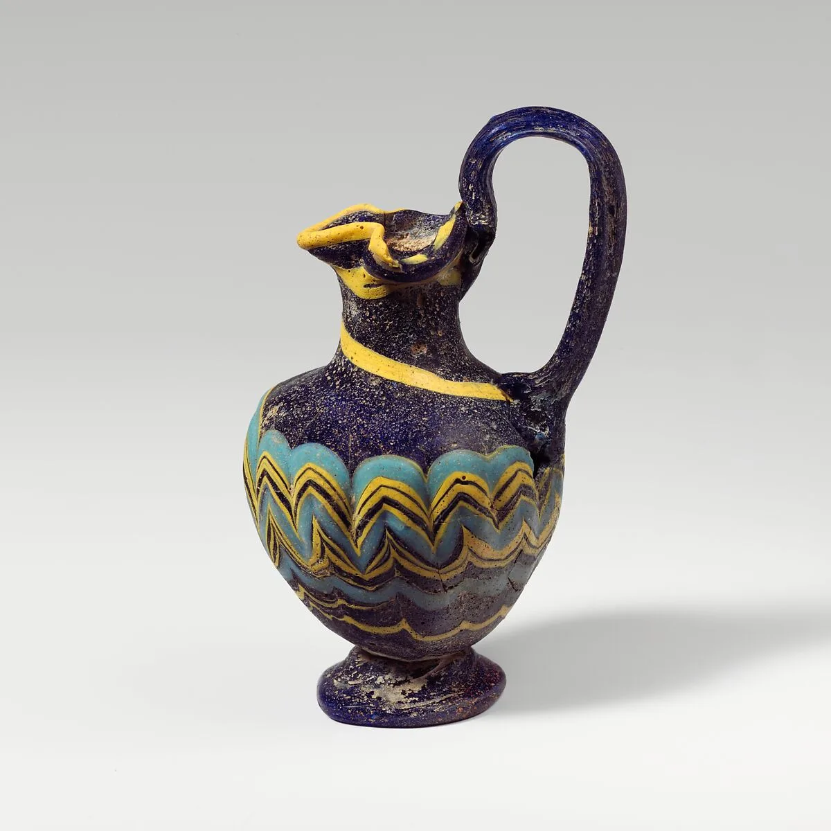 Glass oinochoe (perfume jug) — Unknown