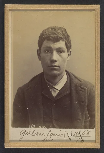 Galau. Charles. 18 ans, né à Nogent s/Marne (Seine). Charron. Cris séditieux. Anarchiste. 21/2/91.