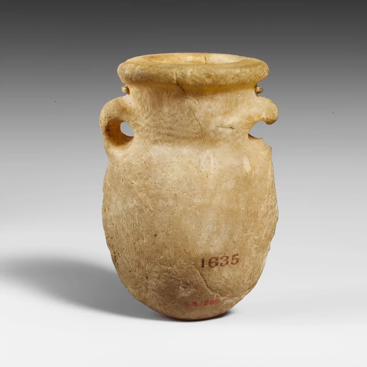 Miniature alabaster lentoid flask — Unknown