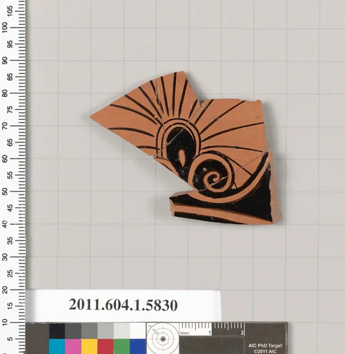 Terracotta fragment of a kylix: eye-cup (drinking cup)