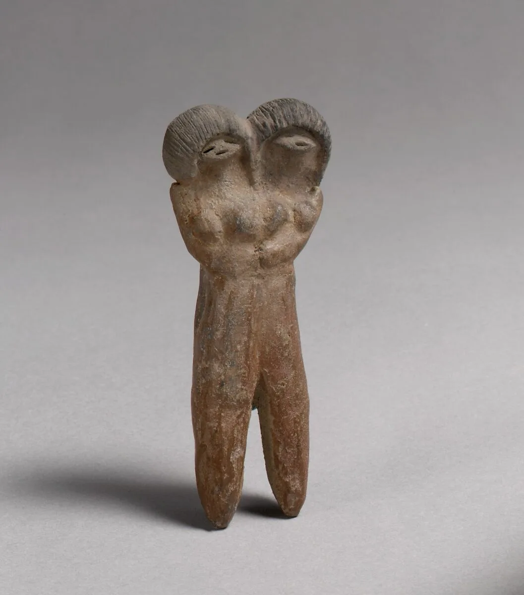 Double-headed figure — Unknown