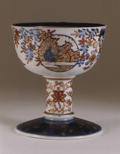 Footed cup